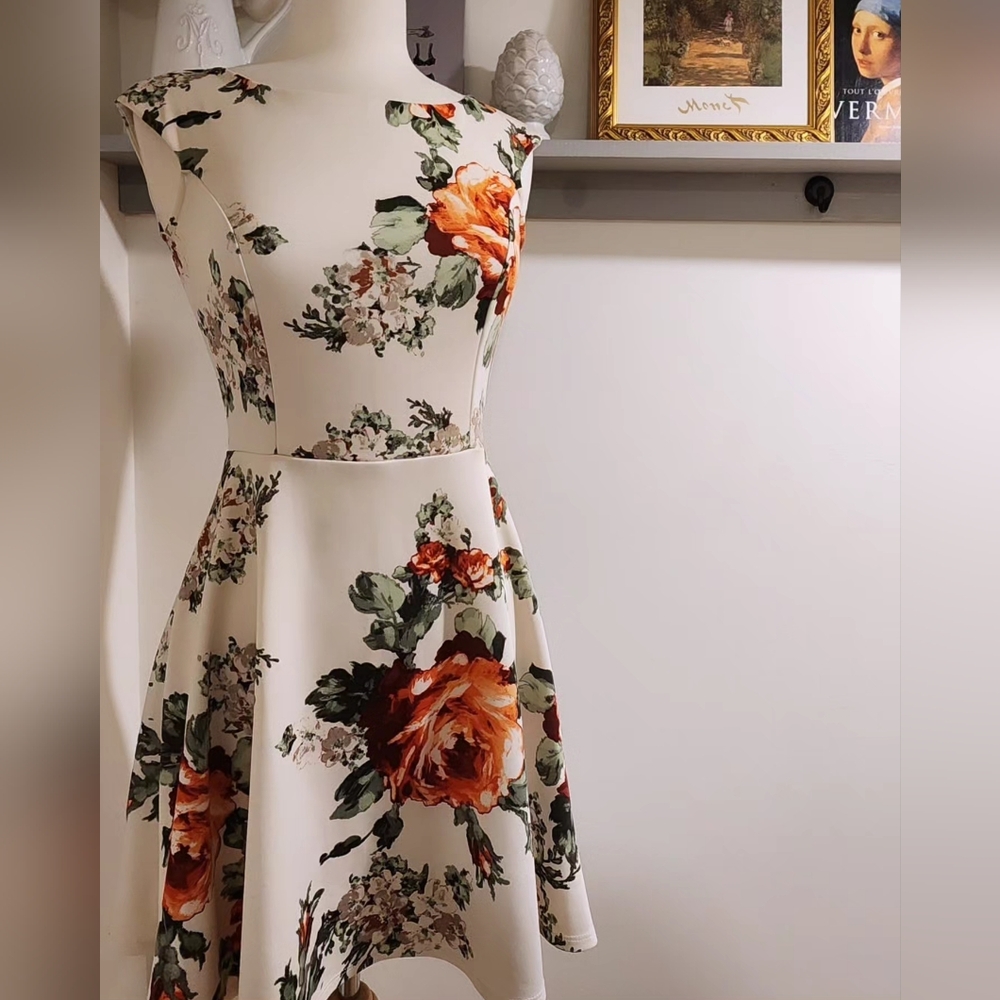 Lovely Off-White Dress with Floral Patterns